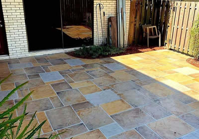 delray concrete patio resurfacing in earth and gray tones geometric shapes